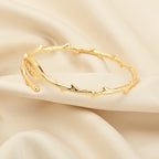 Gemini said Artemis Woodland Leaf Bypass Cuff