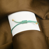 White CZ Gold Floral Bracelets with Blue Thread