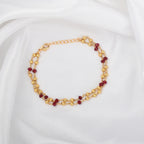 Two-Row Gold-Plated Bracelet with Faceted Ruby Beads