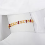 Two-Row Gold-Plated Bracelet with Faceted Ruby Beads