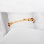 Two-Row Gold-Plated Bracelet with Faceted Ruby Beads
