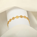 Gold-Plated Textured Disc Link Bracelet with Cubic Zirconia
