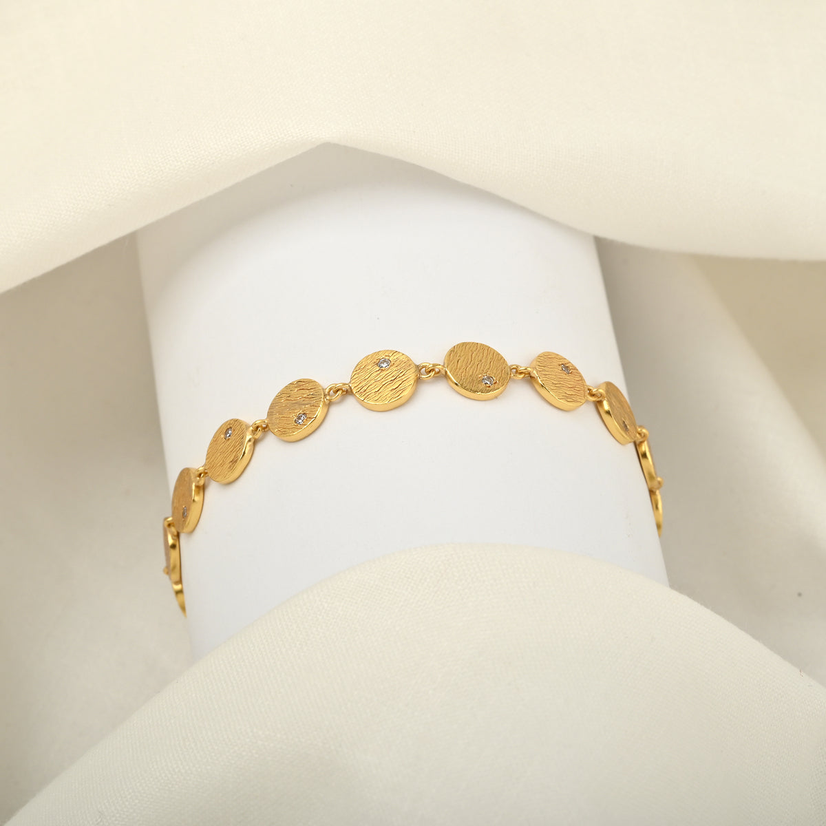 Gold-Plated Textured Disc Link Bracelet with Cubic Zirconia