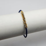 Brass Gold, Silver Plated Metal Beads With Blue Thread Bracelets