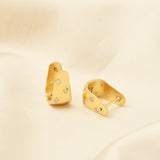 White CZ Huggies Gold Earrings