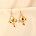 Traditional Gold Diamond-Shaped Earrings with Pink Stone