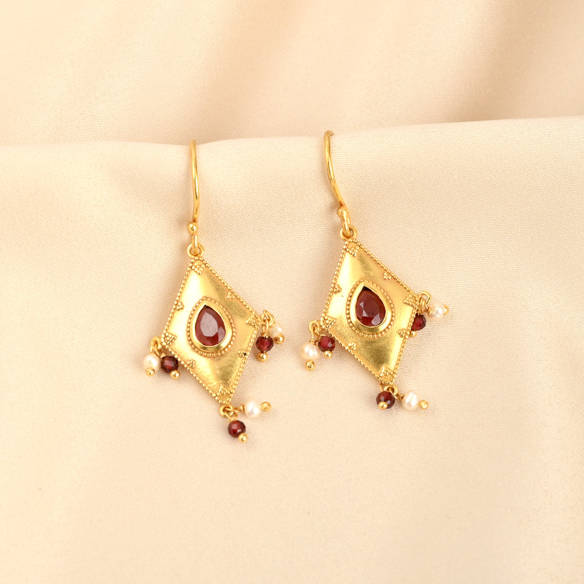 Traditional Gold Diamond-Shaped Earrings with Pink Stone