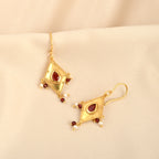 Traditional Gold Diamond-Shaped Earrings with Pink Stone