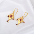 Traditional Gold Diamond-Shaped Earrings with Pink Stone