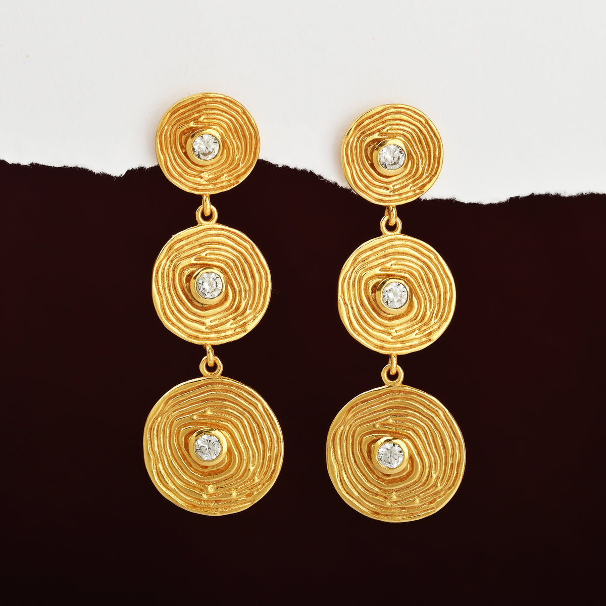 Triple Tier Gold Swirl Drop Earrings with Crystal Accents
