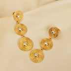 Triple Tier Gold Swirl Drop Earrings with Crystal Accents