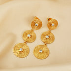 Triple Tier Gold Swirl Drop Earrings with Crystal Accents