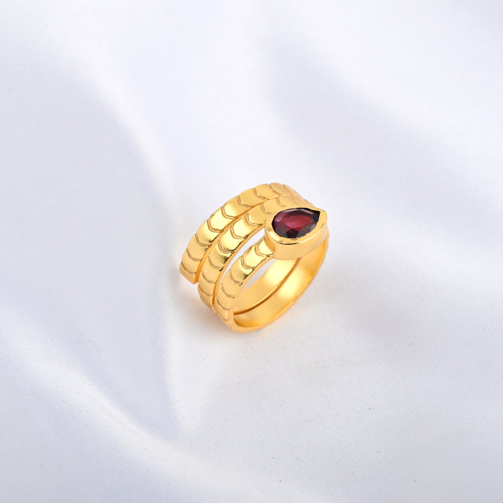 Pear Cut Garnet Spring Ring