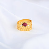 Pear Cut Garnet Spring Ring