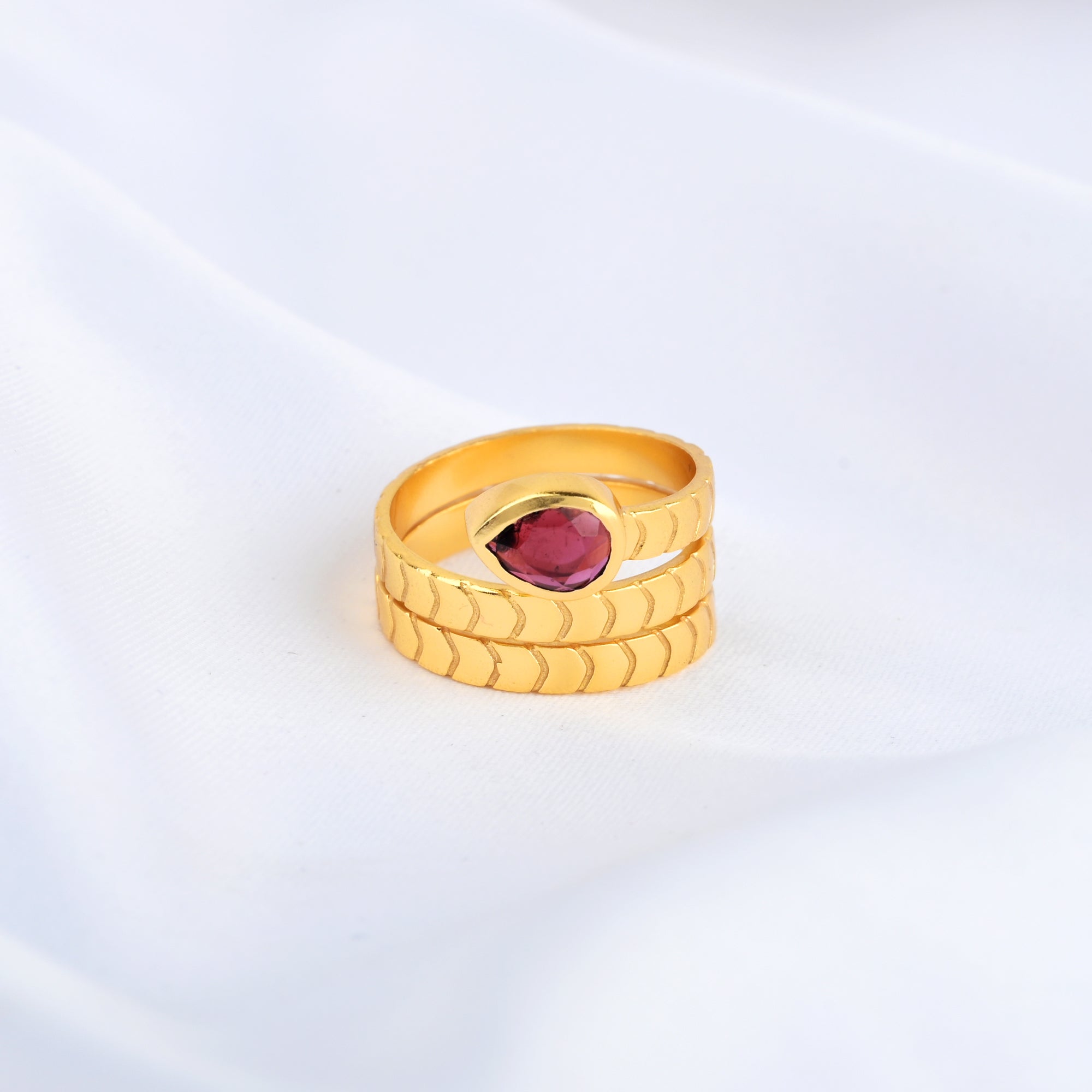 Pear Cut Garnet Spring Ring