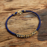 Brass Gold, Silver Plated Metal Beads With Blue Thread Bracelets